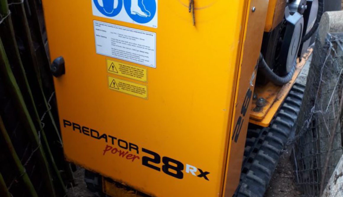 The Predator stump grinder is ideal for getting into small spaces, as the photograph shows! You can see the stump grinde...